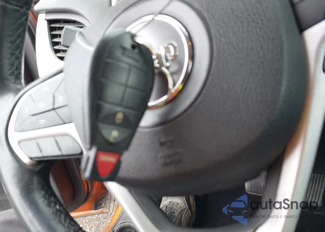 2015 Jeep Cherokee Trailhawk from USA, damaged, VIN 1C4PJMBS5FW717114